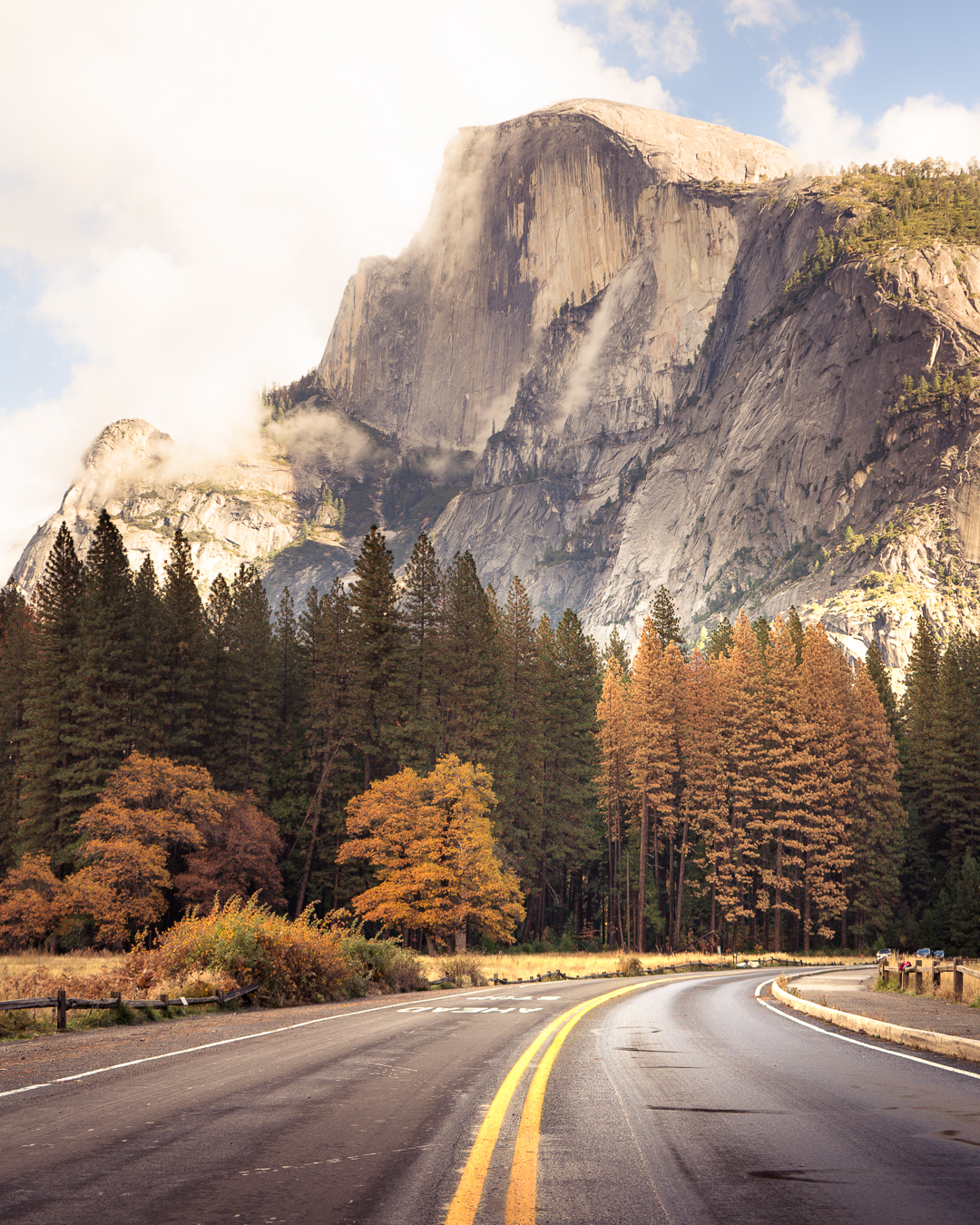 Road shot taken in Yosemite Valley with Half Dome in the distance.