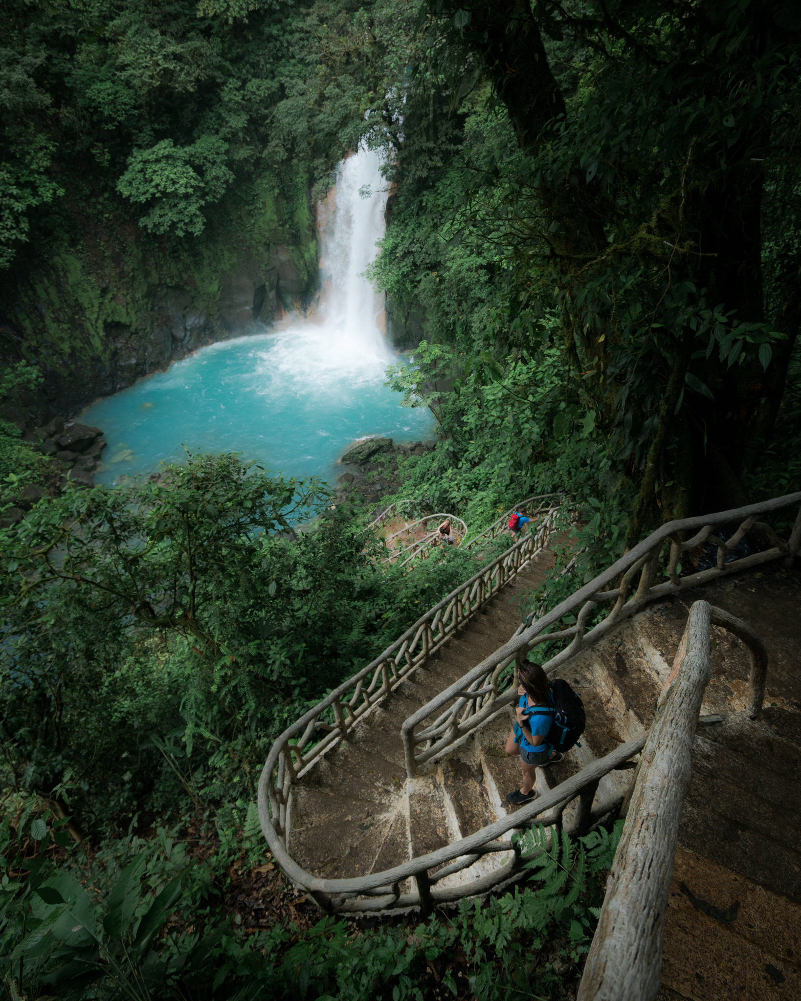 The stunning staircase down to the base of the waterfall at Tenorio Volcano National Park, Costa Rica.