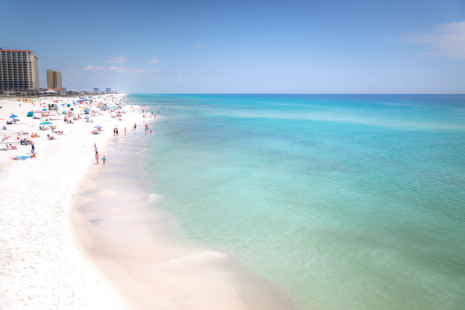 The view of Pensacola Beach from the enormous peer that jets out into The Gulf.