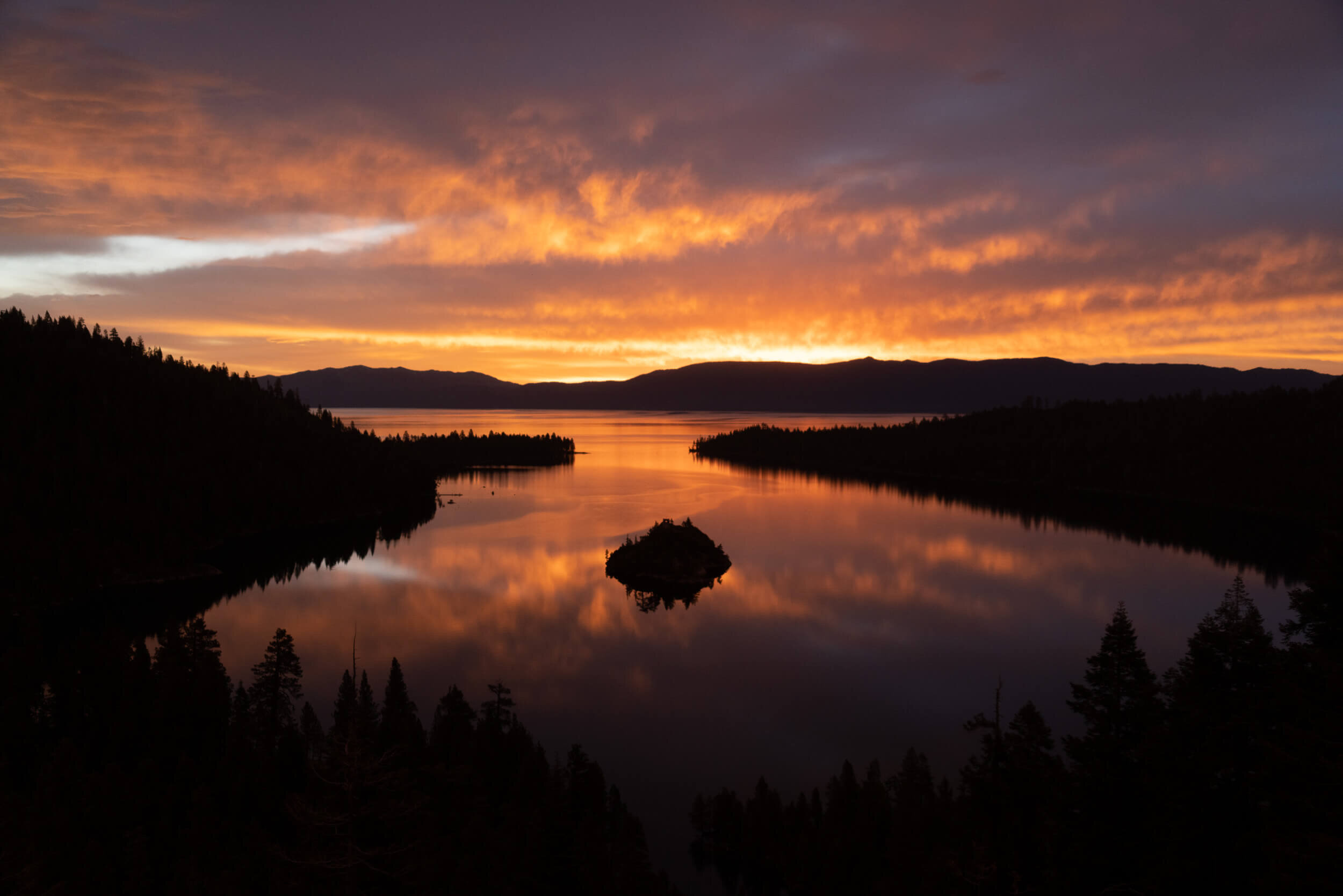 Sunrise on a calm day at Emerald Bay in Lake Tahoe.