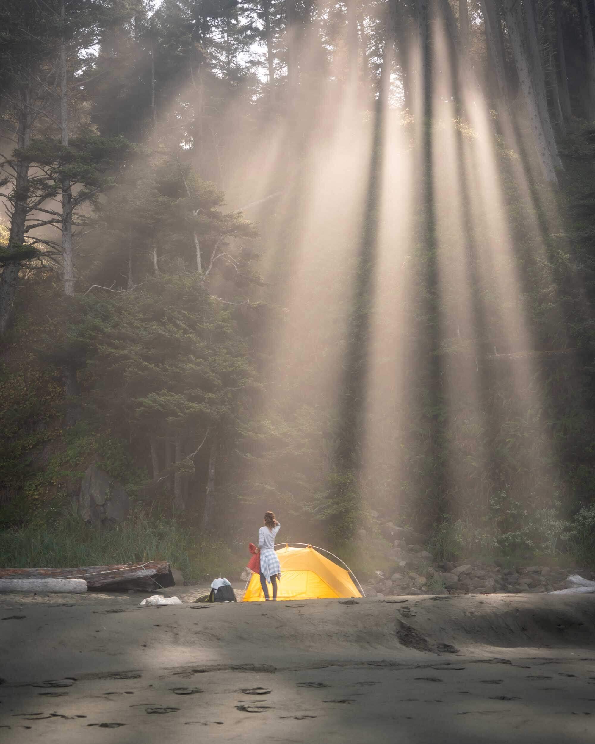 Amazing sun rays coming through the forest onto Shi Shi Beach in Washington. Wearing: The North Face  Long Sleeve Shirt  and Patagonia  Flannel Shirt . Also Shown: Big Agnes  2 Person Tent .