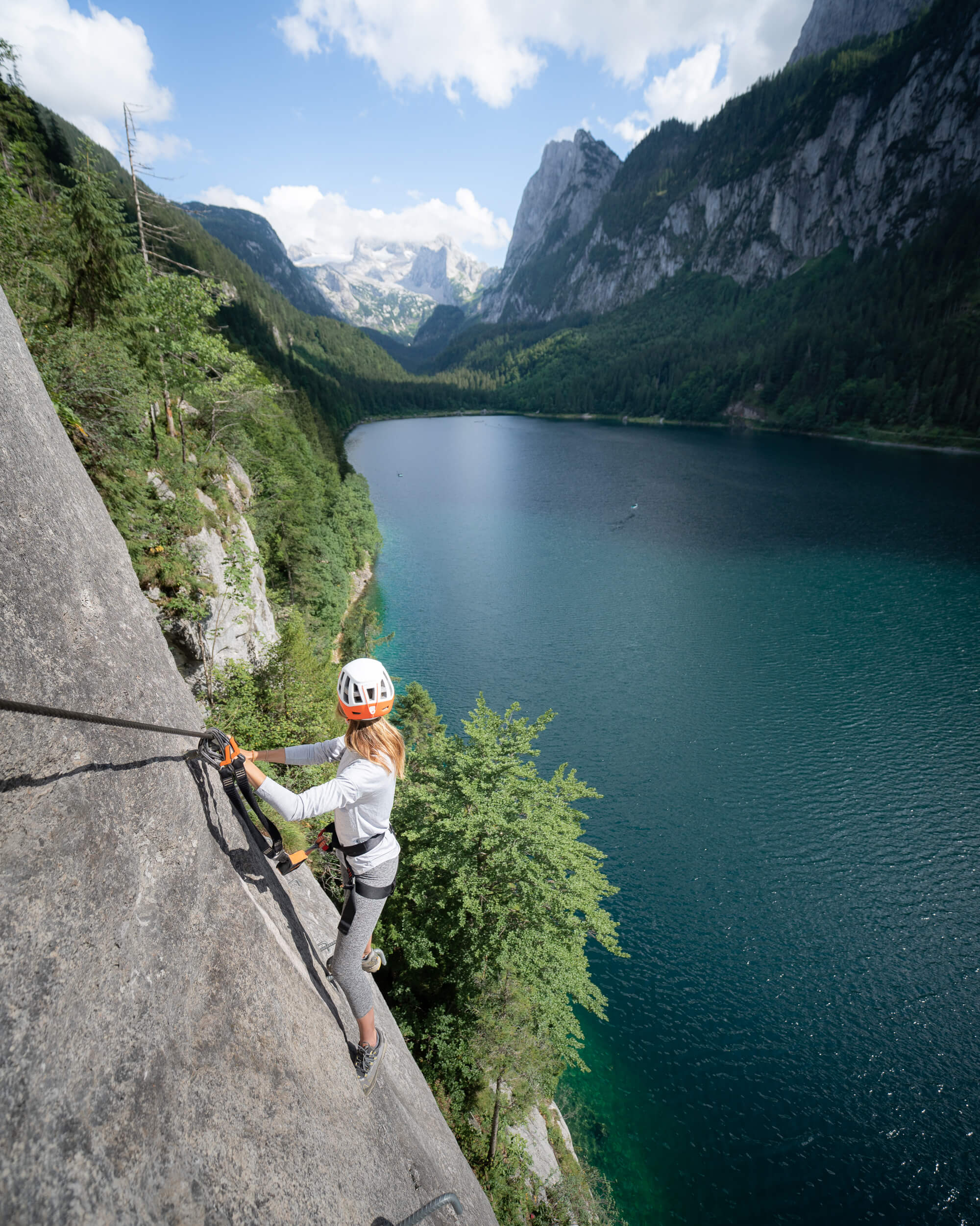Climbing on a via ferrata above Lake Gosau in Austria in preparation for the Ladder to Heaven.