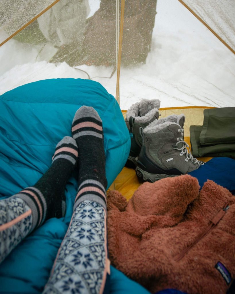 Wool socks are hard to beat for hiking and cold weather camping hacks. Not only are they warm, but they resist odor