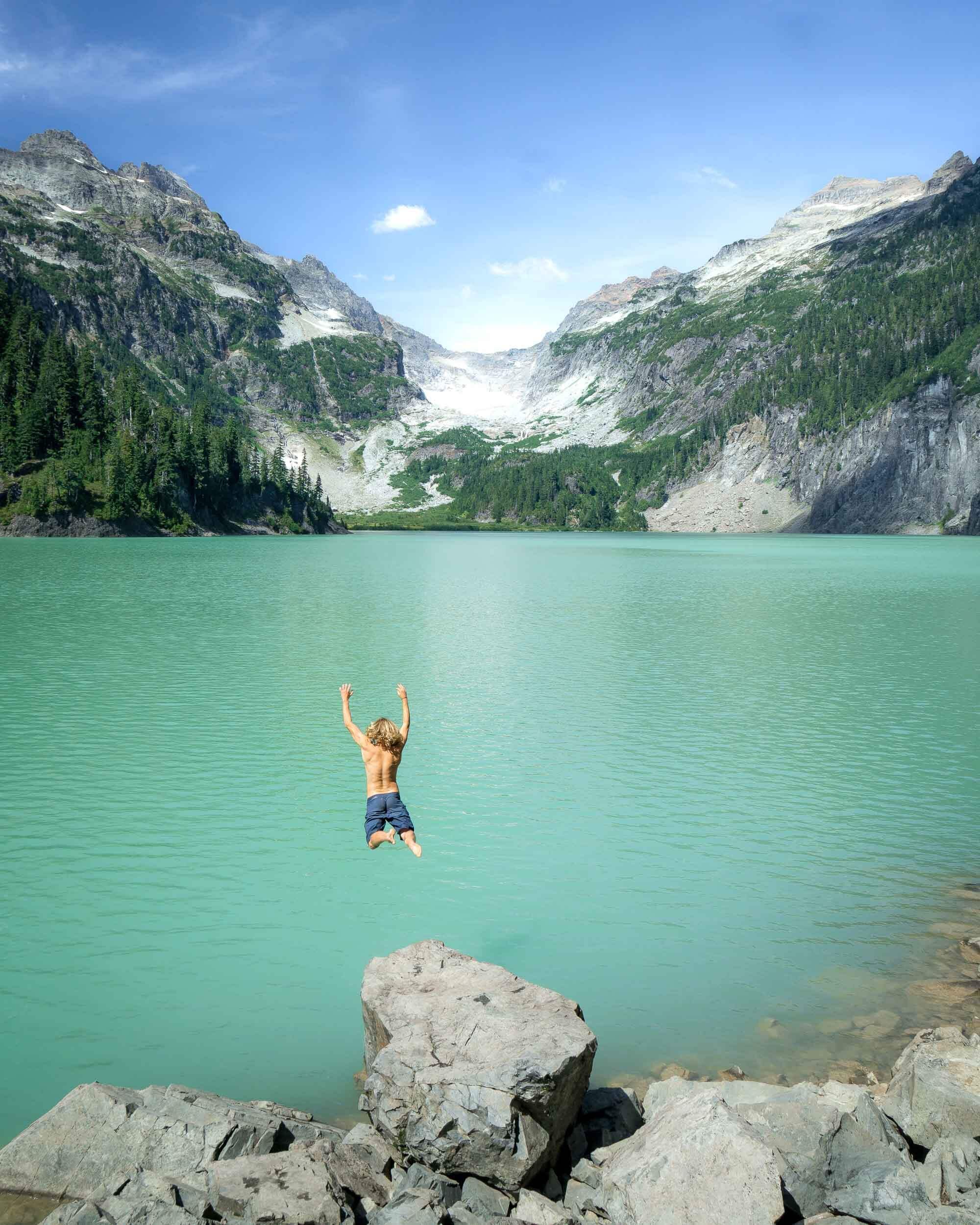 Quin jumping into the glacial water at  Blanca Lake .