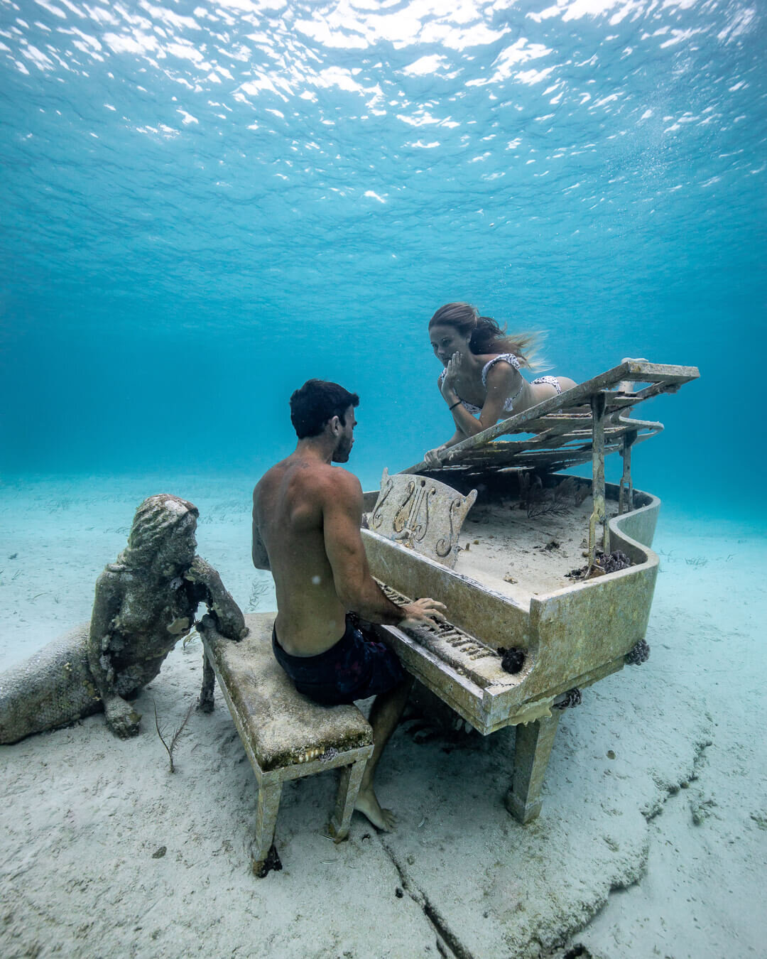 David Langlois  playing the piano for  Lauren Landers  at The Musician. David and Lauren run charter trips through The Bahamas on their sailboat  Boomsharkalaka . Photo by:  Quin Schrock .