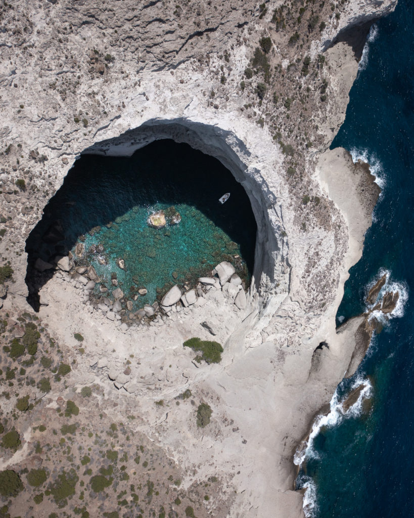 Top down view of Sykia Cave on Milos Island