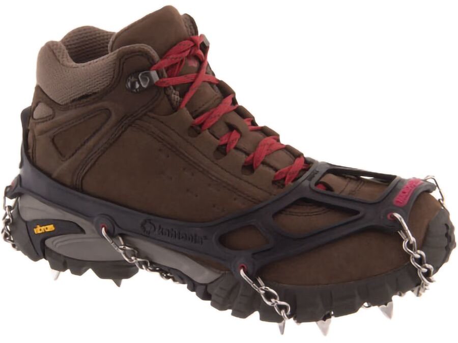 a hiking boot with added spikes traction system - a practical gift for hikers