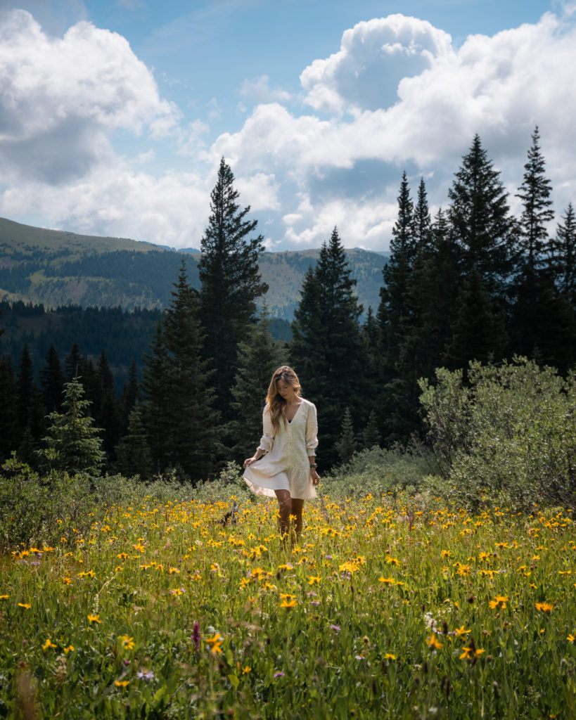 woman on a hike in vail in the summer